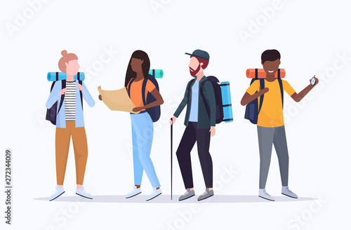 group tourists hikers with backpacks holding compass and travel map searching direction hiking concept mix race travelers on hike full length white background flat horizontal photo