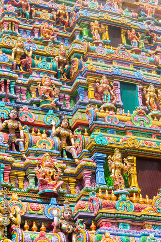 Carved images on the gopura (tower) of the Sri Maha Mariamman Temple, a Tamil Hindi temple located in Silom road, Bangkok, Thailand