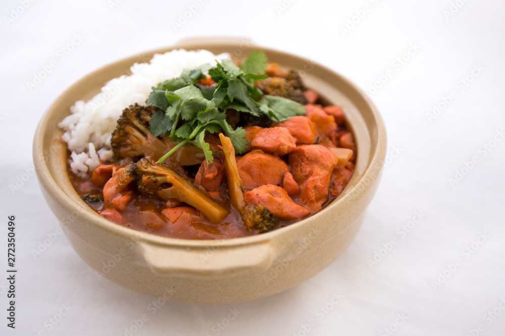 Butter chicken curry with Broccoli in Bowl