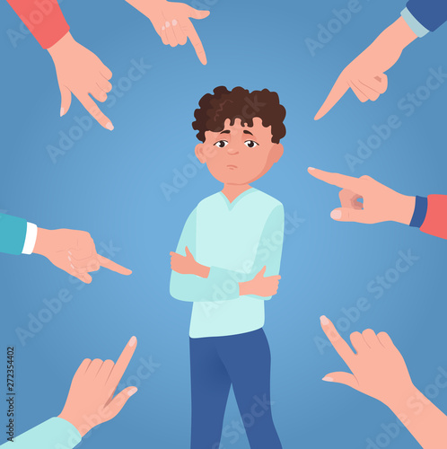 Boy or teenager is scolded, condemned, ordered. Upset or guilty person on blue background.