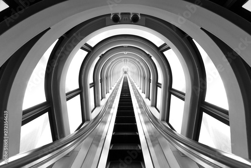 interior view of futuristic tunnel and escalator. Building abstract background