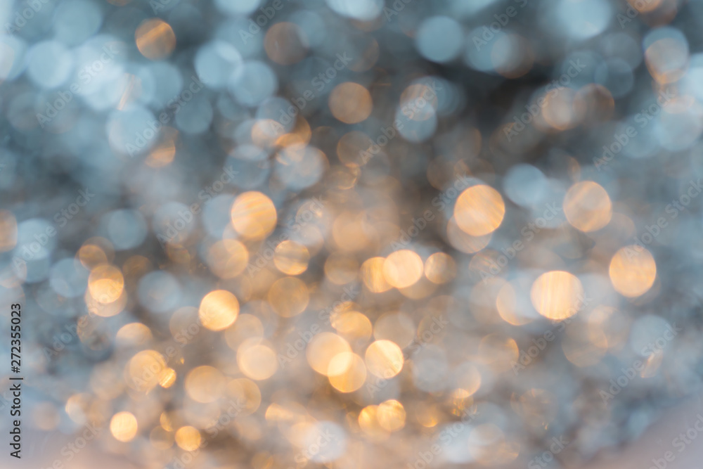 Abstract gold and white bokeh
