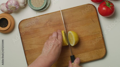 Cutting a lemon in half