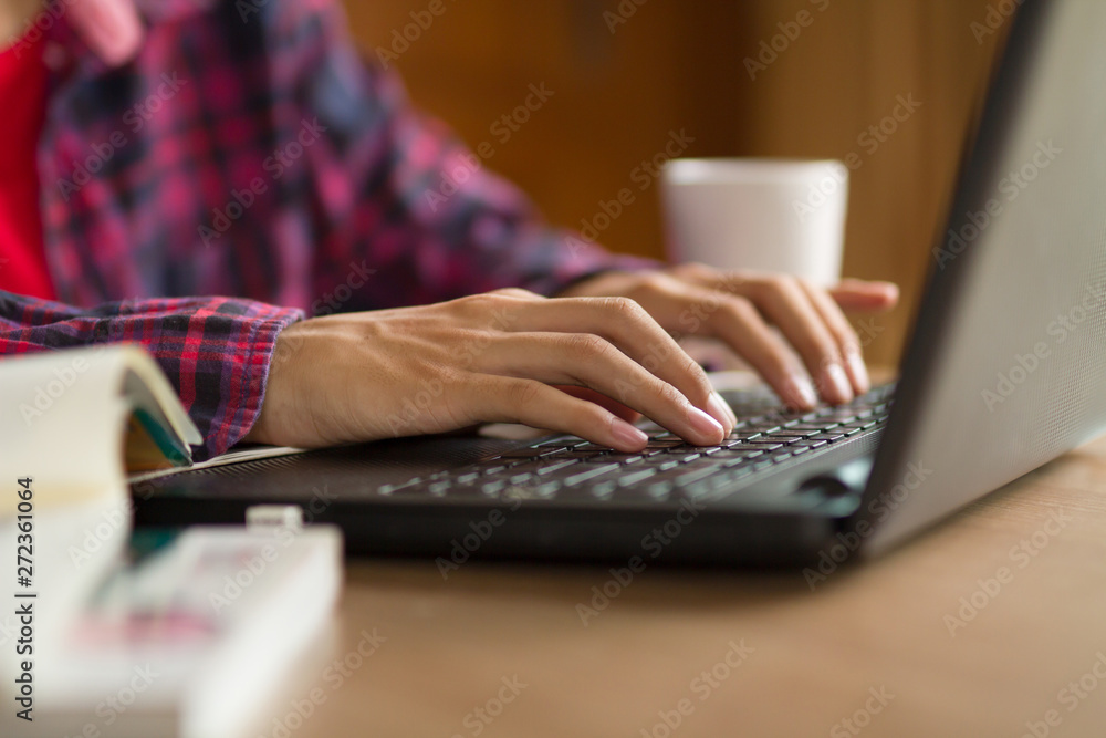 Teenage boy or Gamers typing computer keyboard to writing an article or playing a game at home Teenage boy or Gamers typing computer keyboard to writing an article or playing a game at home