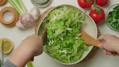 Making a mixed green salad