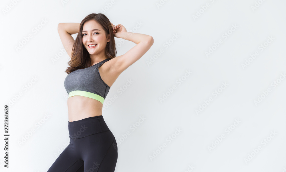Foto de Portrait of beautiful cute healthy asian woman body curve with  sport wear copy space on white background. People beauty perfect body slim  fit fitness girl happy and relaxing. Freedom lifestyle