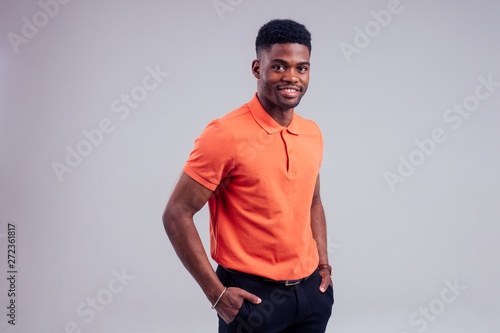 African American curly hairstyle model with an cotton t-shirt white background studio