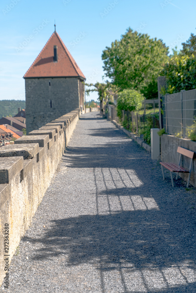 historic medieval city walls with guard tower in Romont in canton Fribourg