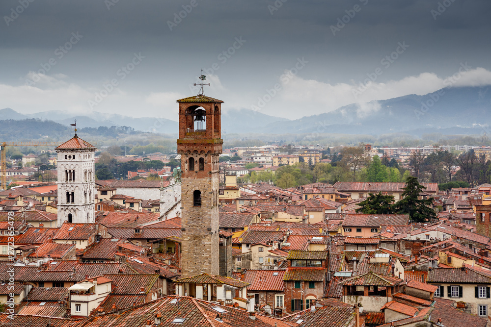 Clock tower and San Michele basilica, Lucca, Italy	
