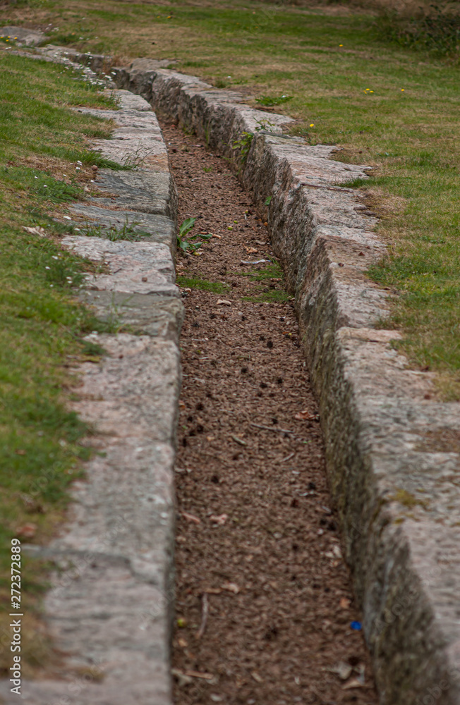 A dried out stream. Gravel with stones on the sides. A dried out stream. Gravel with stones on the sides.