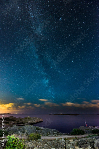 The milky way a dark night seen from the cliffs of the swedish west coast.