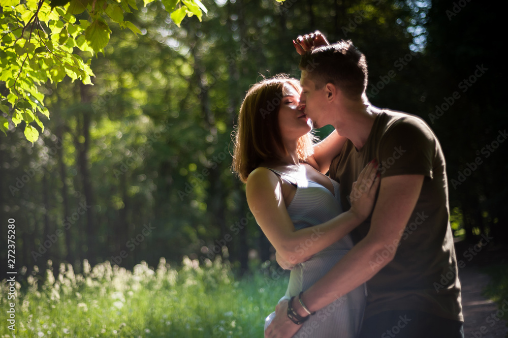Fototapeta premium Young Couple Walking In The Park