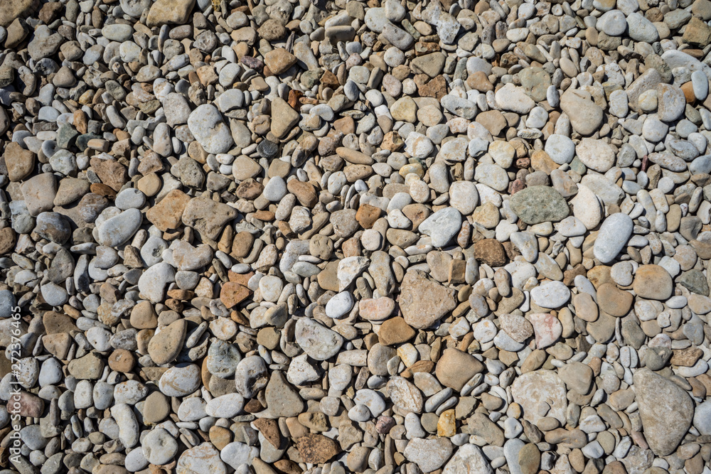 Background of sea pebbles. Limestone rocks on the shores of the Gulf of Finland. Background of sea pebbles. Limestone rocks on the shores of the Gulf of Finland.