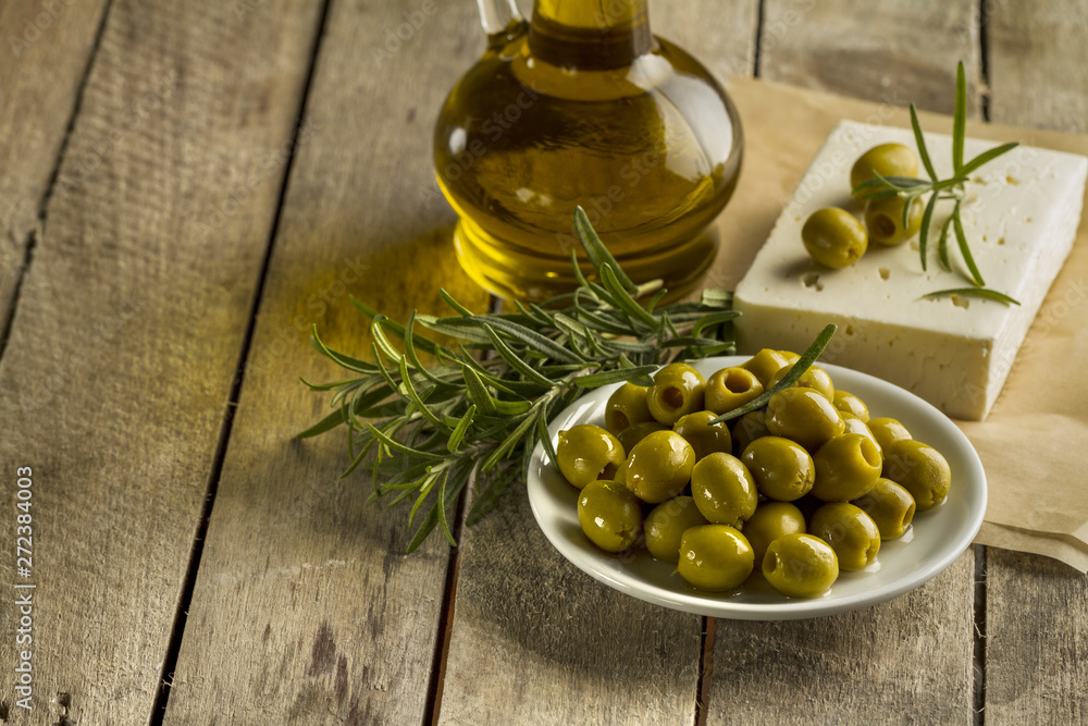 Planks with olives and olive oil Planks with olives and olive oil