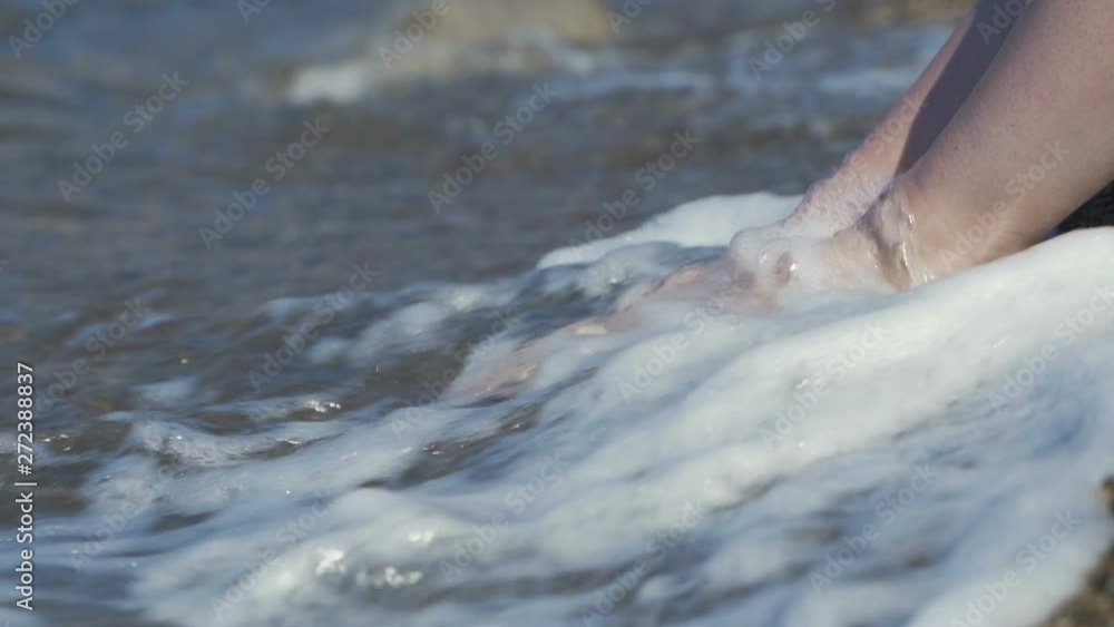 Close up of woman feet on beach. Close up of woman feet on beach.