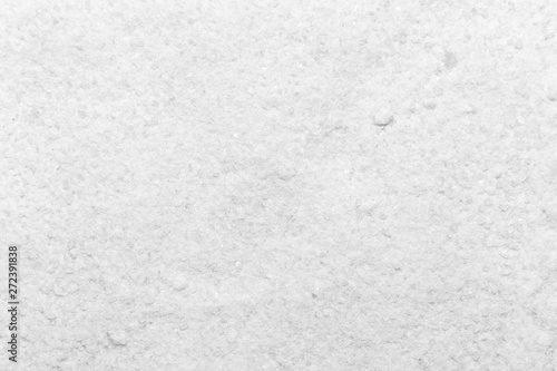 Photo of closeup white texture of salt, background