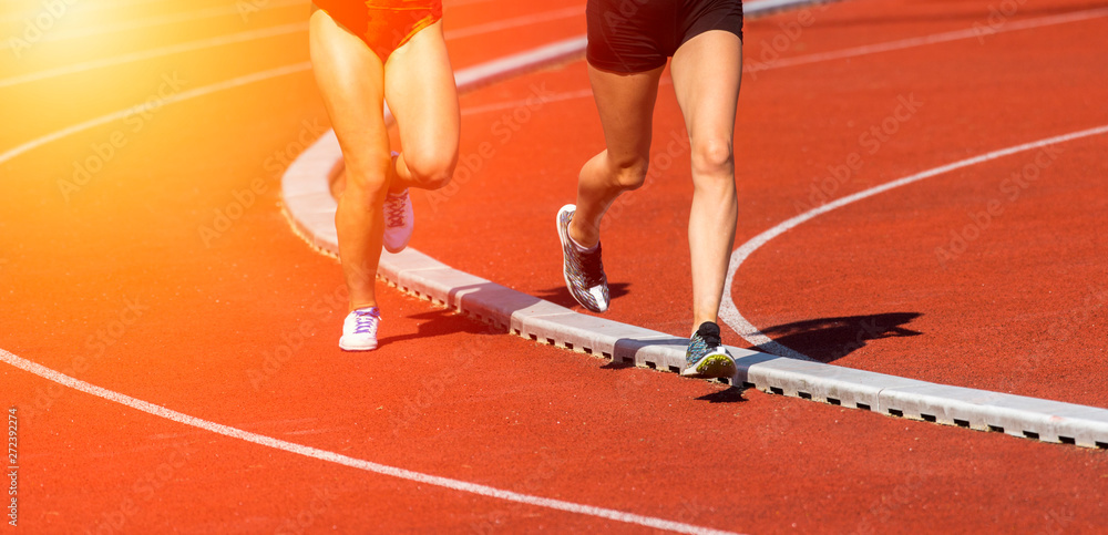 Close up of runners feet on the track field