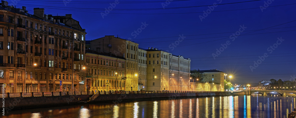 Night view of the Fontanka river embankment in St. Petersburg