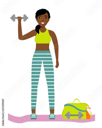 Girl in uniform with dumbbells. Fitness classes.
