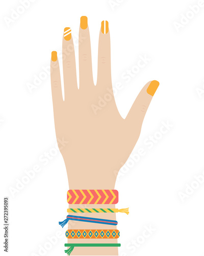 Female hipster hand with baubles of thread.