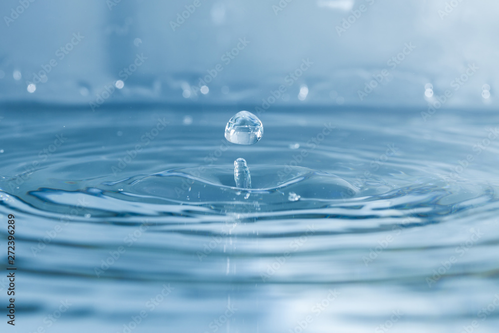 Water surface with delicate drop falling Water surface with delicate drop falling