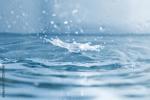 Delicate surface with water drop falling
