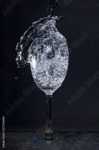 Crystal glass with water in motion