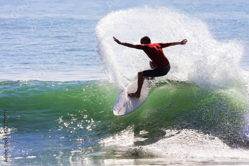 Surfer riding on a wave