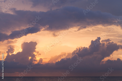 Cloudy tropical sky over ocean