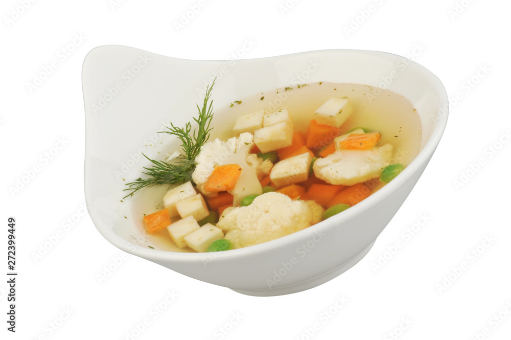 Vegetable soup with cauliflower, potatoes, peas, carrots and dill on a white isolated background Vegetable soup with cauliflower, potatoes, peas, carrots and dill on a white isolated background