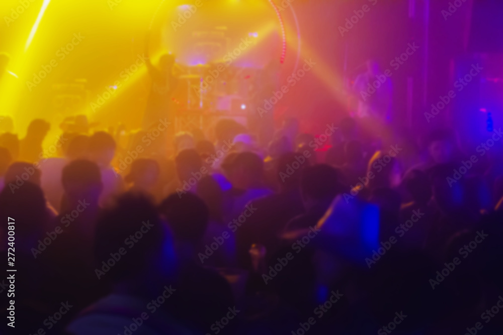 © kowit1982 - Blur Silhouettes people having fun in a club party. background with copy space. © kowit1982 - Blur Silhouettes people having fun in a club party. background with copy space.