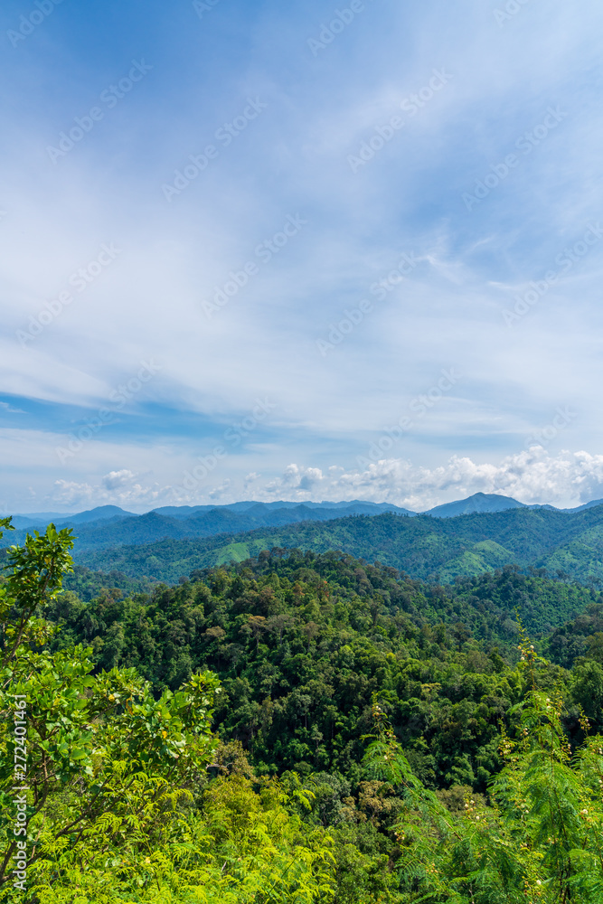 Blue sky high peak mountains fog hills mist scenery national park views at Phu Tub Berk, Khao Koh, Phetchabun Province, Thailand Blue sky high peak mountains fog hills mist scenery national park views at Phu Tub Berk, Khao Koh, Phetchabun Province, Thailand