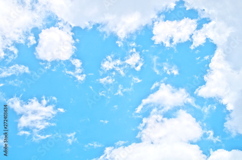 Blue sky in sunny day with brilliant white puffy clouds in rounded tops  flat bottoms calls Cumulus clouds  cumulus humilis  cumulus fractus  for summer season concept  freshness natural background