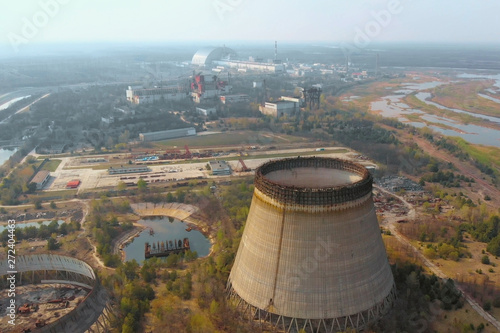 Chernobyl nuclear power plant. Cooling tower overlooking the nuclear power plant in Chernobyl. View of the destroyed nuclear power plant. Chernobyl nuclear power plant, aerial view. Chernobyl NPP photo