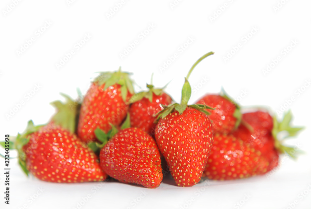 Red berry strawberries on a white background Red berry strawberries on a white background