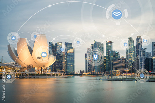 Smart city and wireless communication network concept. Digital network connection lines of Singapore at Marina Bay