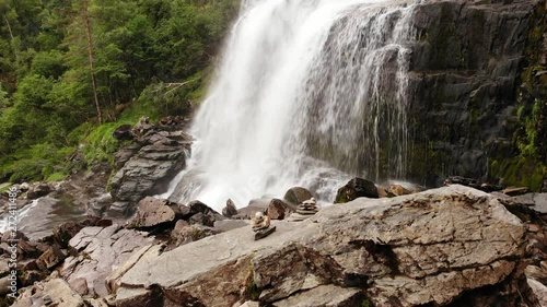 Svandalsfossen in Norway, waterfall in norwegian mountains. National tourist Ryfylke route photo