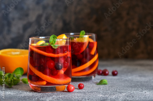Hot cranberry tea with orange, mint and spices.
