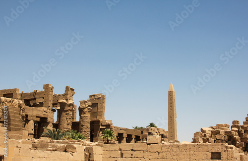 Ruins and obelisk in the complex of the Karnak temple, ancient architecture of Egypt in Luxor