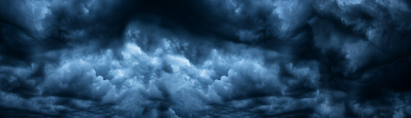 Dark cloudy sky before thunderstorm panoramic background. Storm heaven panorama. Wide gloomy backdrop