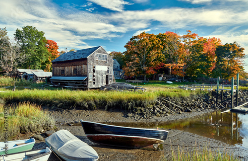 фотография Fall in Essex, Massachusetts, USA. Autumn scene at old wharf.