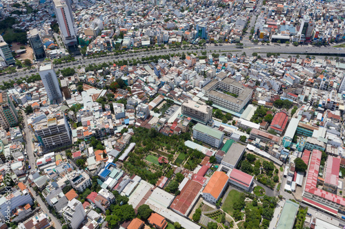 Top View of Building in a City - Aerial view Skyscrapers flying by drone of Ho Chi Mi City with development buildings  transportation  energy power infrastructure. include Landmark 81 building 