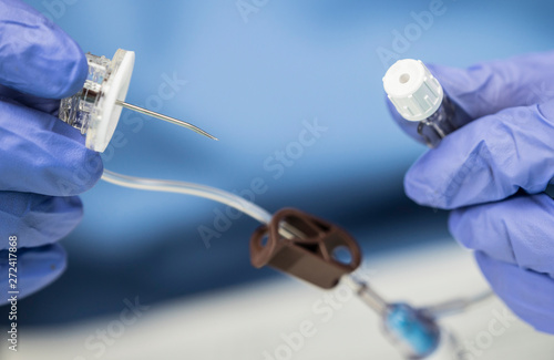 фотографія Nurse prepares Venous catheters of Long Duration in a hospital, Accessing Indwel