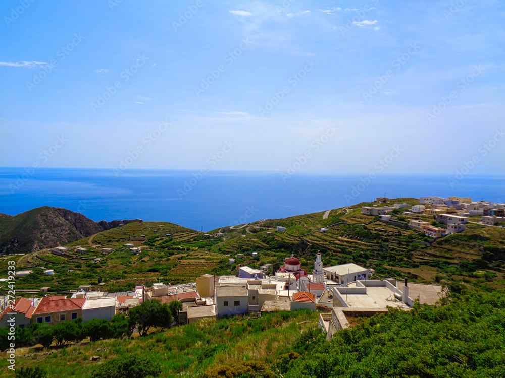 view to a small village in greece in the bay