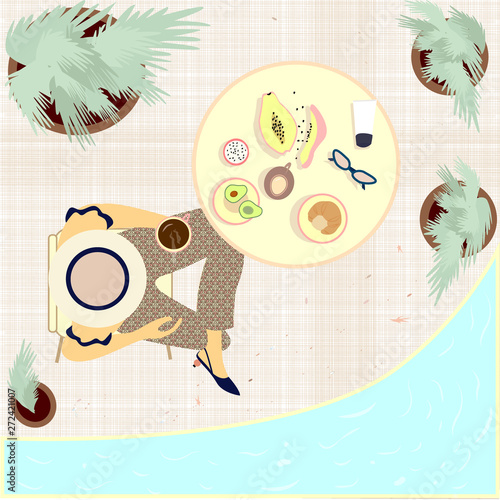 Flat girl having light summer breakfast at the table