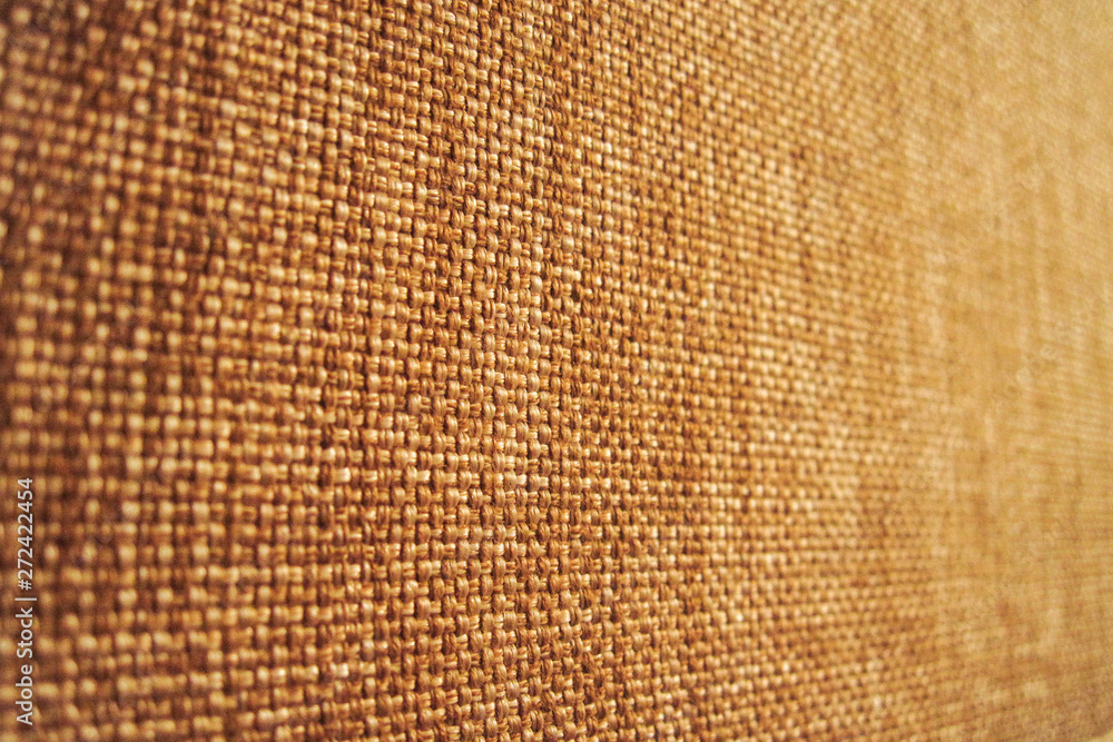 Weaved fabrics background. Perspective view with partly soft focus Weaved fabrics background. Perspective view with partly soft focus
