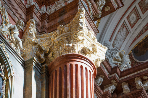 baroque interior of the Parish Church "Poznanska Fara". Column details. Poznań, Poland.