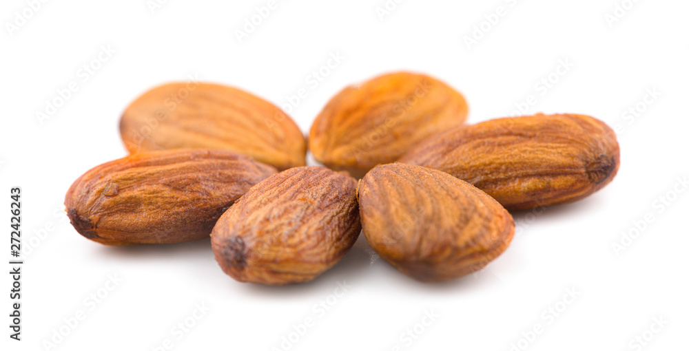 Heap of almonds isolated on white background Heap of almonds isolated on white background