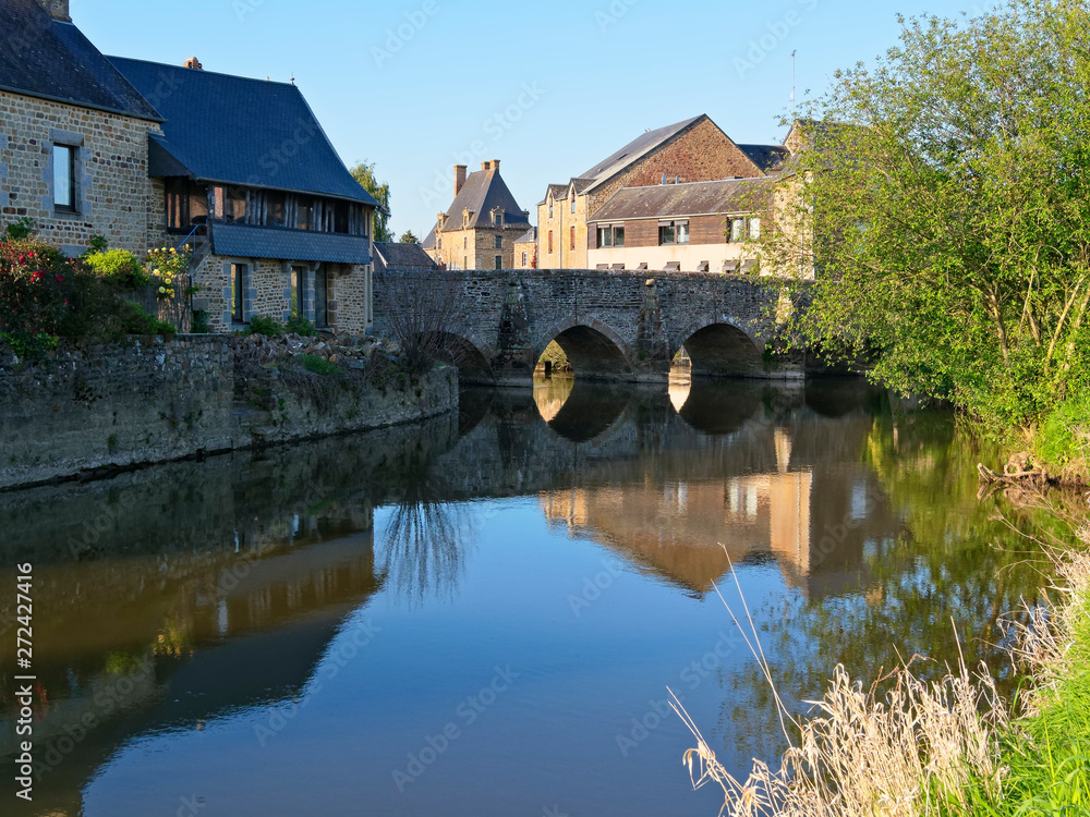 Stone bridge over the River Selune in Ducey, France