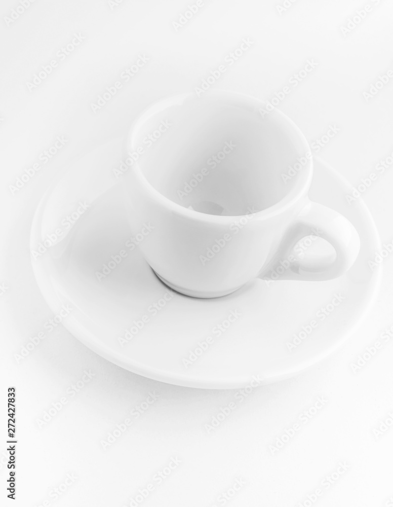 white coffee cup and saucer, empty coffee-free coffee cup, top side view, or black coffee, on a white background white coffee cup and saucer, empty coffee-free coffee cup, top side view, or black coffee, on a white background